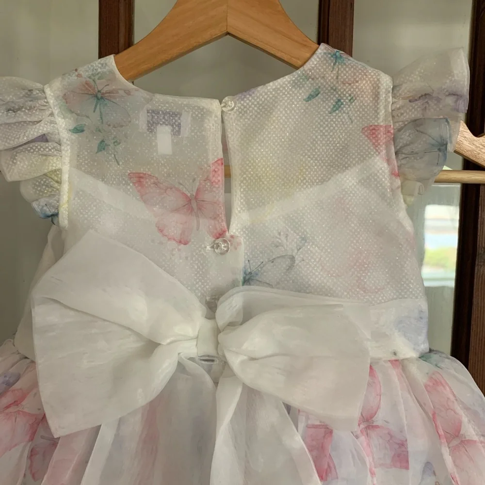 Blueberi Boulevard elegant white dress with soft pastel butterfly print size 5